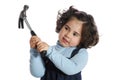 Little girl holding tools