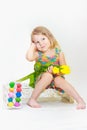 Little girl holding tulips with Easter eggs Royalty Free Stock Photo