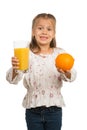 Little Girl Holds a Glass with an Orange Juice wit Royalty Free Stock Photo