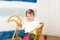 Little girl on a horse rocking chair Royalty Free Stock Photo