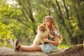 Little girl hug Spitz