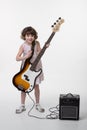 Little girl and huge bass guitar