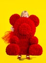 Little girl with a huge bear in her stature of roses. gift bear of roses Royalty Free Stock Photo