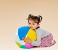Little girl hugging a big ball Royalty Free Stock Photo