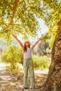 Little girl hugging big tree Royalty Free Stock Photo