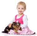 Little girl hugging a puppy. isolated on white background Royalty Free Stock Photo