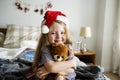 Little girl hugging a toy bear Royalty Free Stock Photo