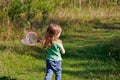 Girl hunting butterflies