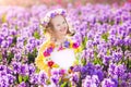 Little girl in hyacinth field Royalty Free Stock Photo