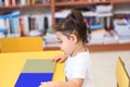 Happy child little girl reading a book. Royalty Free Stock Photo