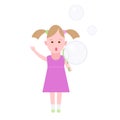 Little girl inflates soap bubbles