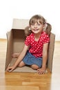 Little girl inside a paper box Royalty Free Stock Photo