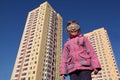 Little girl in jacket and big glasses Royalty Free Stock Photo