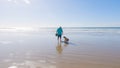 Little girl winter clamming at Pismo Beach Royalty Free Stock Photo