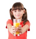 Little girl with juice in his outstretched hands Royalty Free Stock Photo