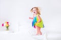 Little girl jumping on a bed Royalty Free Stock Photo