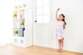 Little girl kid children standing in wooden floor Royalty Free Stock Photo