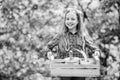 Little girl kid in forest. little girl with gardening tools. earth day. spring village country. ecology environment Royalty Free Stock Photo