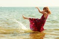 Little girl kid splashing in sea ocean water. Fun Royalty Free Stock Photo