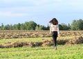 Little girl walking on field Royalty Free Stock Photo