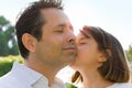 Little Girl Kissing Dad on Cheek Royalty Free Stock Photo