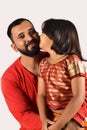 Little girl kissing her father on the cheek, Pune, Maharashtra Royalty Free Stock Photo