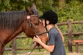 Little girl kissing her pony Royalty Free Stock Photo