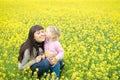 Little girl kissing mother Royalty Free Stock Photo