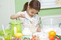 Little girl in kitchen Royalty Free Stock Photo