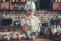 Little girl in kitchen Royalty Free Stock Photo