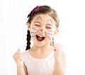 Little girl with kitty painted face