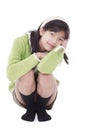 Little girl kneeling down, resting Royalty Free Stock Photo