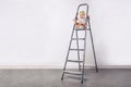 Little girl at the ladder Royalty Free Stock Photo