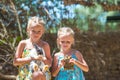 Little girl with a land tortoise and cute rabbit