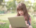 Little girl with laptop. Royalty Free Stock Photo