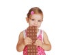 Little girl with large chocolate