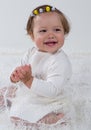 Little girl laughs and claps her hands Royalty Free Stock Photo