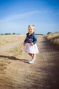 Little girl with lavender flower bouquet Royalty Free Stock Photo