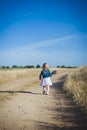 Little girl with lavender flower bouquet Royalty Free Stock Photo