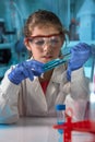 Little girl learning science chemical in the class in the laboratory of school Royalty Free Stock Photo