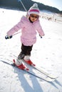 Little girl learning skiing Royalty Free Stock Photo