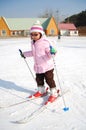 Little girl learning skiing Royalty Free Stock Photo