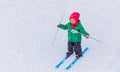 Little girl learning to ski in winter Royalty Free Stock Photo