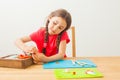 Little girl is learning to use colorful play clay Royalty Free Stock Photo