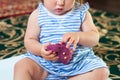 Little girl is learning to use colorful play dough indoor. Royalty Free Stock Photo