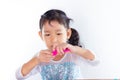 Little girl is learning to use colorful play dough Royalty Free Stock Photo