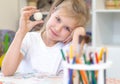 Little girl is learning to use play dough Royalty Free Stock Photo