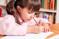 Little girl learning to write Royalty Free Stock Photo
