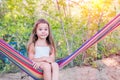 Little girl lies in a hammock Royalty Free Stock Photo