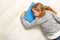 The little girl lies and sleeps on the floor. The child fell asleep while reading a book Royalty Free Stock Photo